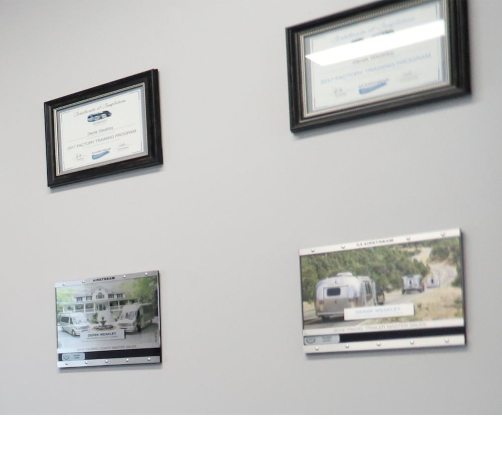 Derek's Certificates on Wall